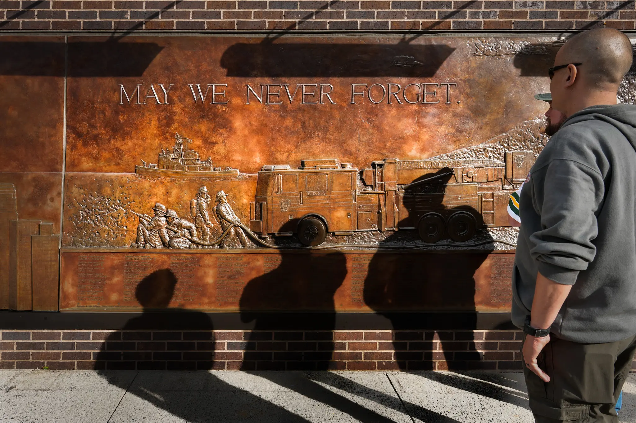 Veterans standing at a 911 Memorial in NYC